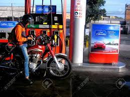 motorcycle getting gas
