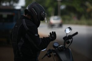 motorcyclist gearing up